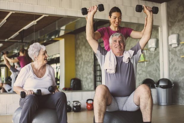 seniors in gym working out