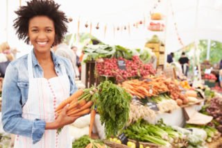 woman buying fresh vegetables